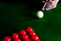 Game snooker billiards or opening frame player ready for the ball shot, athlete man kick cue on the green table in bar