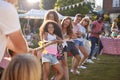 Game Of Tug Of War At Summer Garden Fete