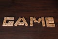 Game - The word is laid out from domino stones Royalty Free Stock Photo