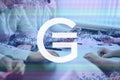 GameCredits, game cryptocurrency sign. The concept of business, cryptocurrency and finance - a team of businessmen are sitting in