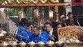 Gamelan Sekaten, a group of javanese traditonal music players (niyaga) playing traditional Javanese music Royalty Free Stock Photo