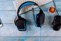 Gamepads headphones and keyboard with mouse on old wood blue table Royalty Free Stock Photo