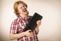 Gamer man holding computer keyboard Royalty Free Stock Photo