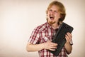 Gamer man holding computer keyboard Royalty Free Stock Photo