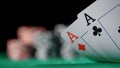 Gamer person playing poker in casino. Betting chips stacks. Dealer and gambler. Royalty Free Stock Photo