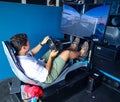 Gamers enjoy Playseat Formula E new racing simulator inside the Gaming Arena during 2019 New York City E-Prix