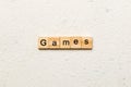 games word written on wood block. games text on table, concept