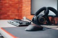 Gaming arena background with mouse gear headphones computer, focuse on headphones selected focuse Royalty Free Stock Photo