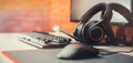 Gaming arena background with mouse gear headphones computer, focuse on headphones selected focuse long banner Royalty Free Stock Photo