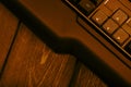 Gaming computer keyboard on a wooden table. Up and down buttons on a computer keyboard Royalty Free Stock Photo