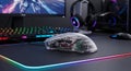 Gaming Computer Mouse With Transparent Shell On RGB Desk Royalty Free Stock Photo