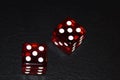 Gaming dice on black background