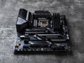 Gaming motherboard MSI MAG Z490 TOMAHAWK on a dark background. Modern desktop PC hardware components for build and upgrade. Front