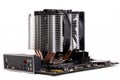 PC mainboard with CPU cooler on white Royalty Free Stock Photo