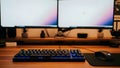Gaming Setup with Dual Monitors and Mechanical Keyboard Royalty Free Stock Photo