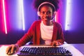 Gaming streamer, African girl playing online fighting with Esport. Tastemaker.