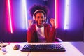 Gaming streamer, African girl playing online fighting with Esport. Tastemaker.