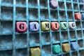 Gaming word made with building wooden blocks Royalty Free Stock Photo