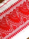 Gamosa or gamusa is a traditional textile pattern from Assam