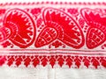 Gamosa or gamusa is a traditional textile pattern from Assam