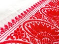 Gamosa or gamusa is a traditional textile pattern from Assam