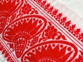 Gamosa or gamusa is a traditional textile pattern from Assam