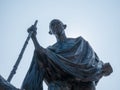 Gandhi statue isolated on blue background Royalty Free Stock Photo