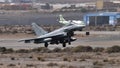 NATO fighter jet lading on airbase runway Royalty Free Stock Photo