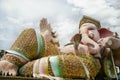 Ganesh statue pink color thai called Phra Pikanet at outdoor for people visit and respect praying at Lord Ganesha Park