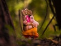 Ganesha the indian god is in the jungle now with bokeh Royalty Free Stock Photo