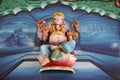 Ganesha sitting on lotus flower, India