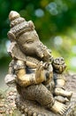 Ganesha Statue on Green Background