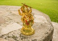 Ganesha on a table in the garden