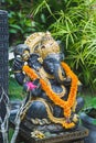 Ganesha in Ubud garden in Bali. Symbolism and religion in Indonesia Royalty Free Stock Photo