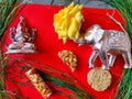 Ganesha/Vinaygar, Elephant toys and peanut chikki,yellow rose