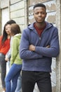 Gang Of Teenagers Hanging Out In Urban Environment Royalty Free Stock Photo