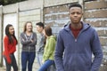 Gang Of Teenagers Hanging Out In Urban Environment Royalty Free Stock Photo