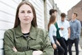 Gang Of Teenagers Hanging Out In Urban Environment Royalty Free Stock Photo