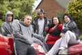 Gang Of Youths Sitting On Cars