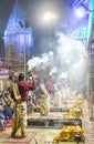 Ganga aarti rituals performed by young priests on the bank of Ganges rivert at Varanasi India. Royalty Free Stock Photo