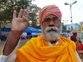 A gangasagar yatri or sadhu baba with a blessing hand at Calcutta transit camp prior to Gangasagar yatra.G