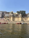 Ganges river with boats docked near the steps. Varanasi, Uttar Pradesh, India Royalty Free Stock Photo