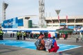 Gangneung, Gangwon province, South Korea - Foreign tourists couple resting on a street in 2018 Pyeongchang Winter Olympics.