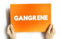 Gangrene is death of body tissue due to a lack of blood flow or a serious bacterial infection, text concept on card