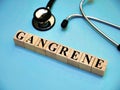 Gangrene, text words typography written with wooden letter, health and medical