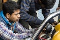 Gangtok, India, March 8 2017: Repair of the headlights on a car