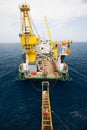 Gangway between barge and oil and gas platform, worker walked passed the way for work on the platform Royalty Free Stock Photo