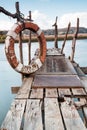 Gangway over the water and a lifebuoy Royalty Free Stock Photo