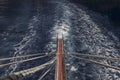 Gangway and trail at sea from a yacht, blue sea