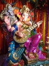 Ganpati Bappa playing the guitar